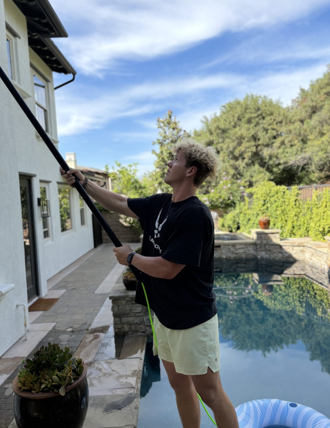 Ryan MacDougall working on window cleaning